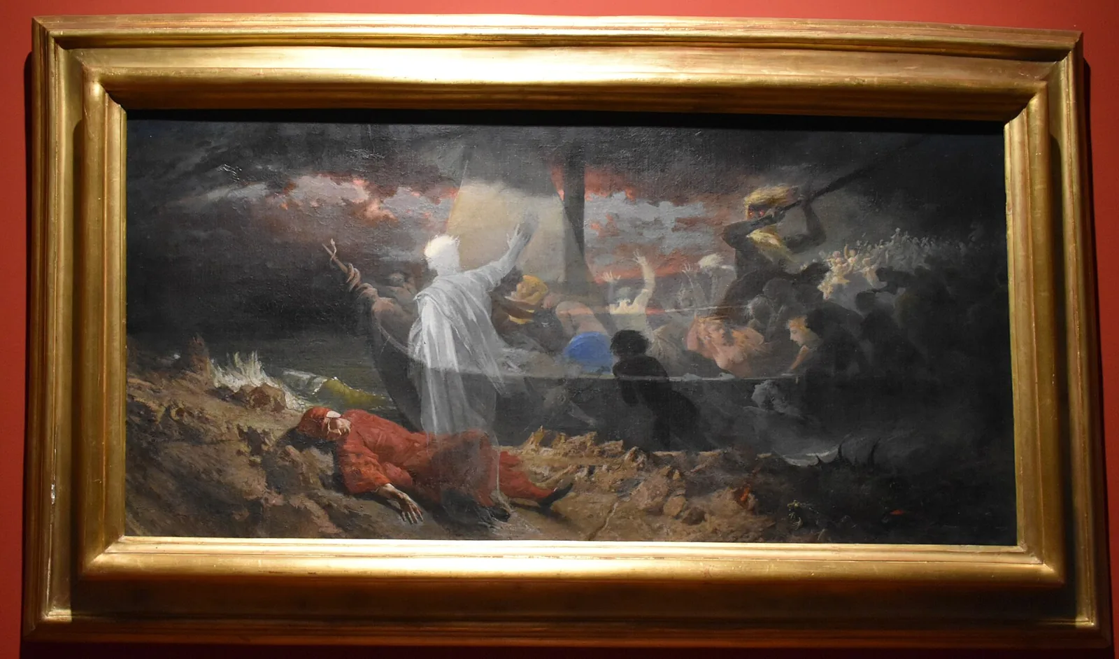Painting Caronte transports souls in a museum frame