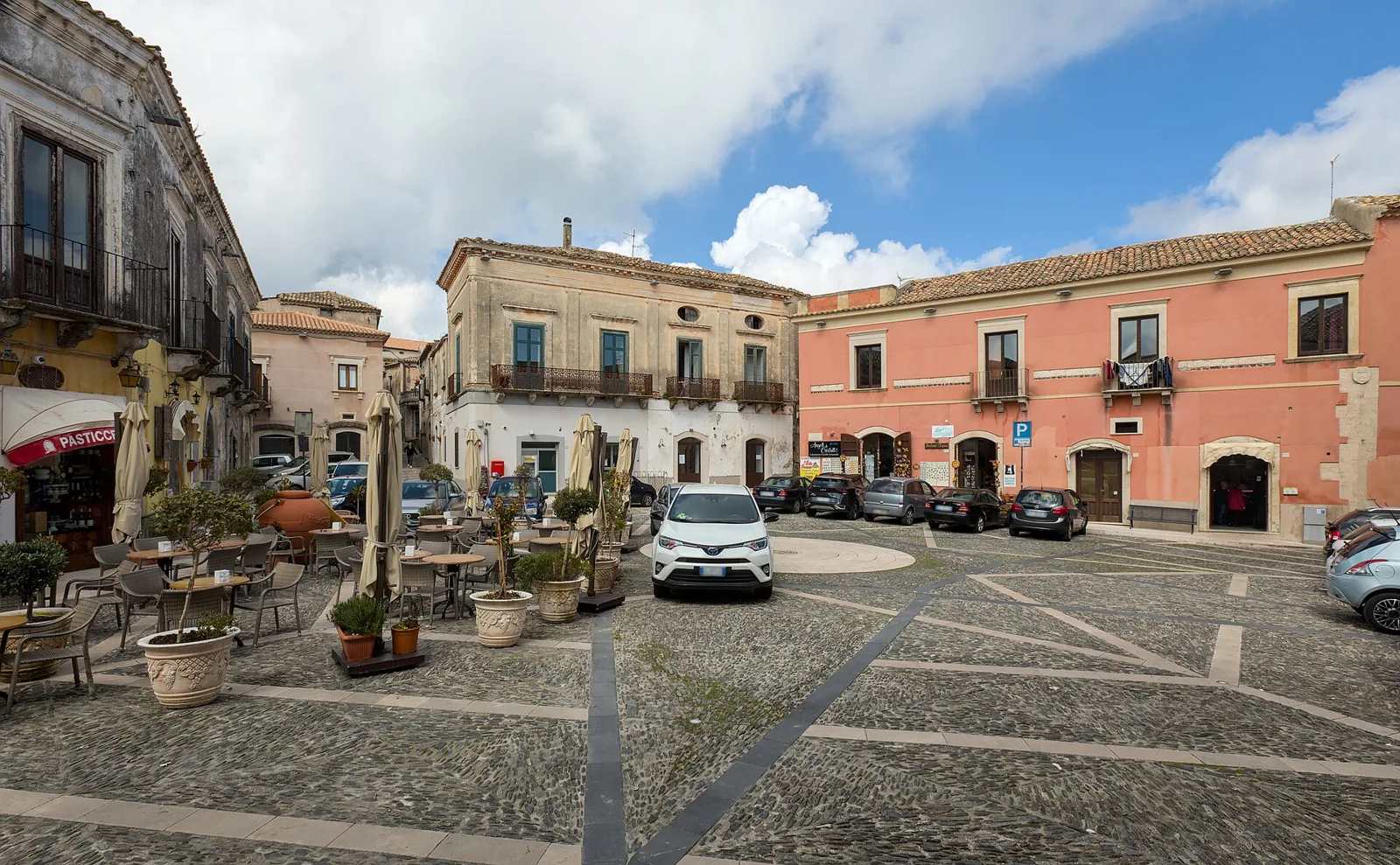 Piazza del Tocco in Gerace with cafés and façades