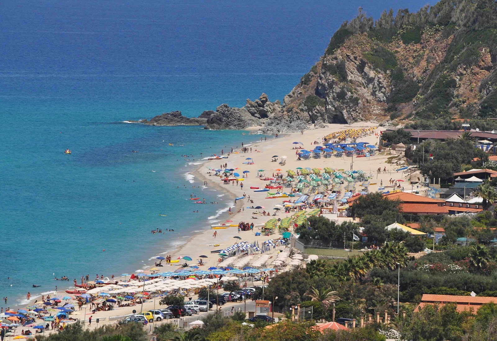 Zambrone bay with turquoise water and steep cliff