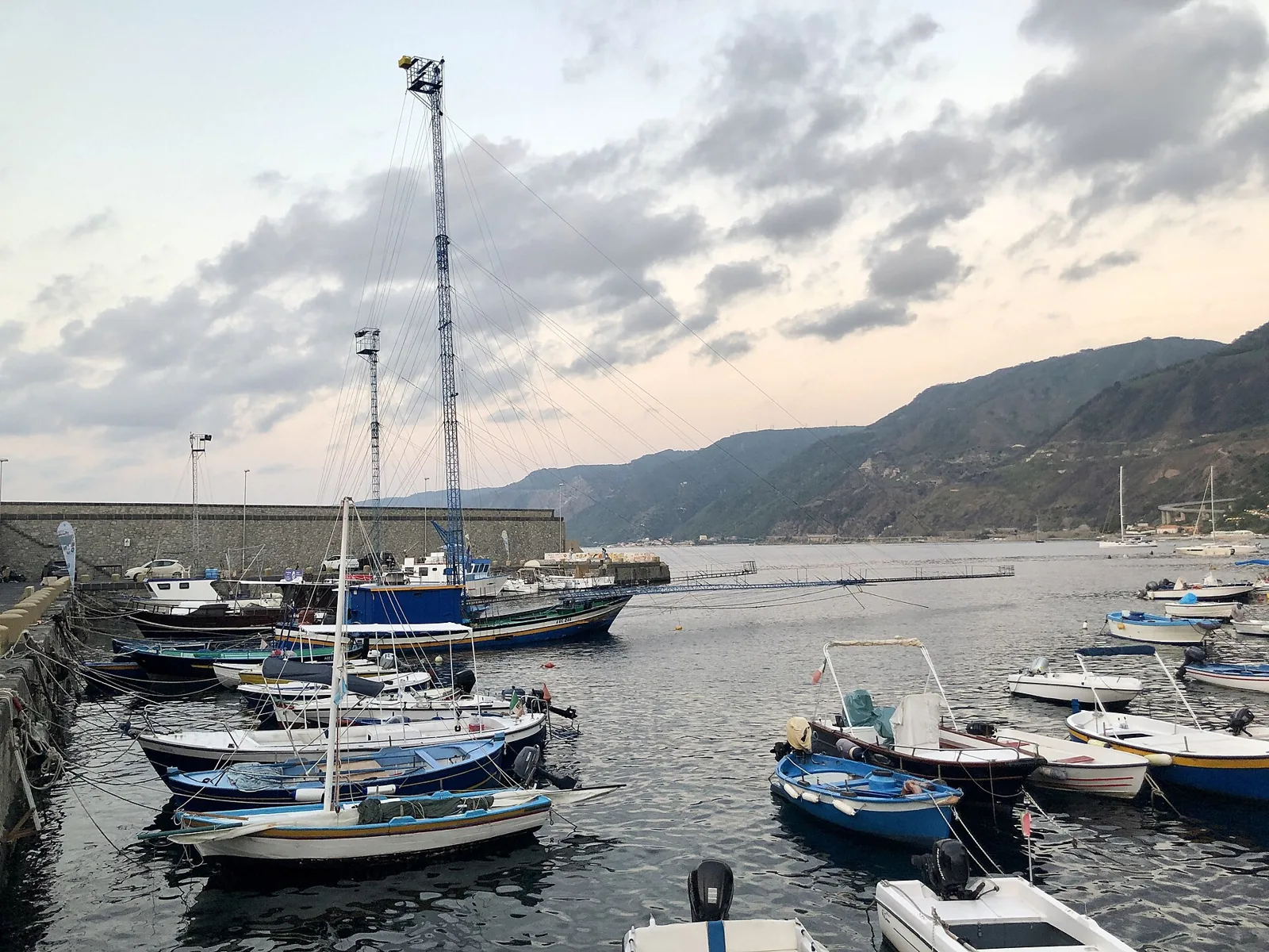 Fishing boats in Scilla harbor at sunset