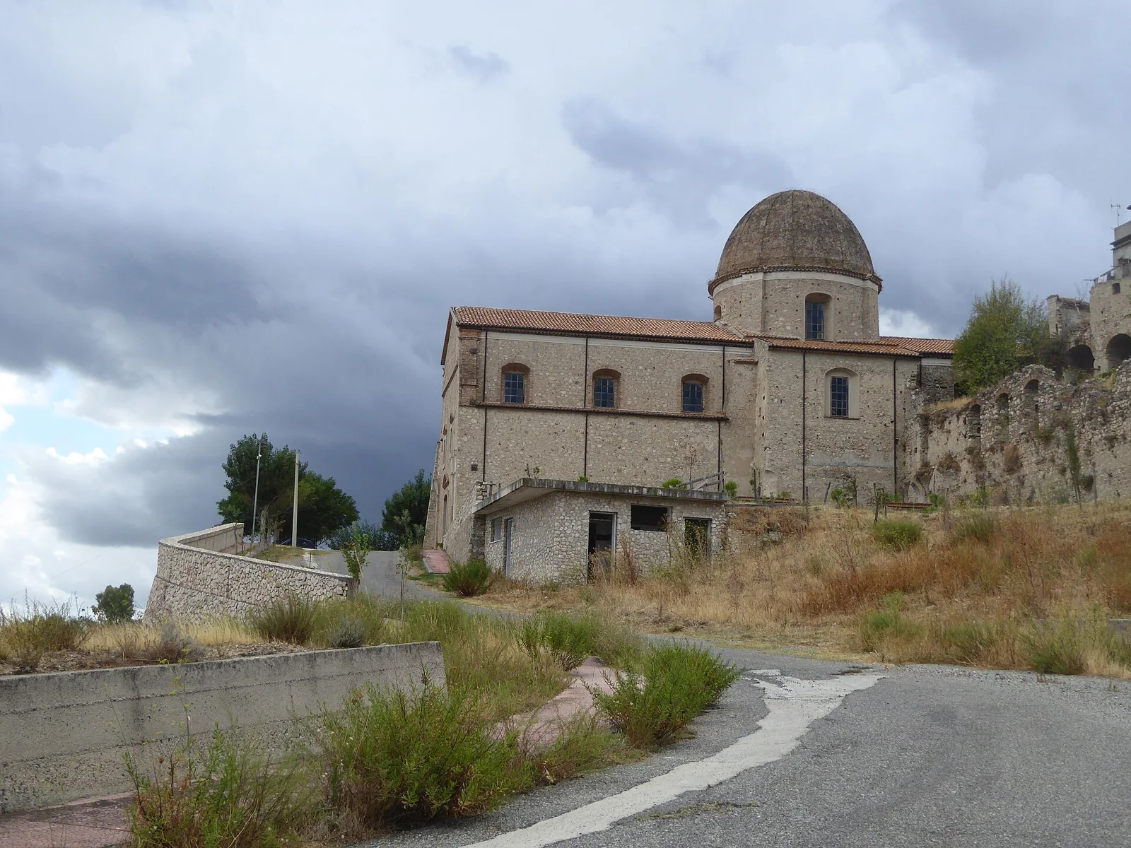 San Domenico church in Stilo under stormy skies.