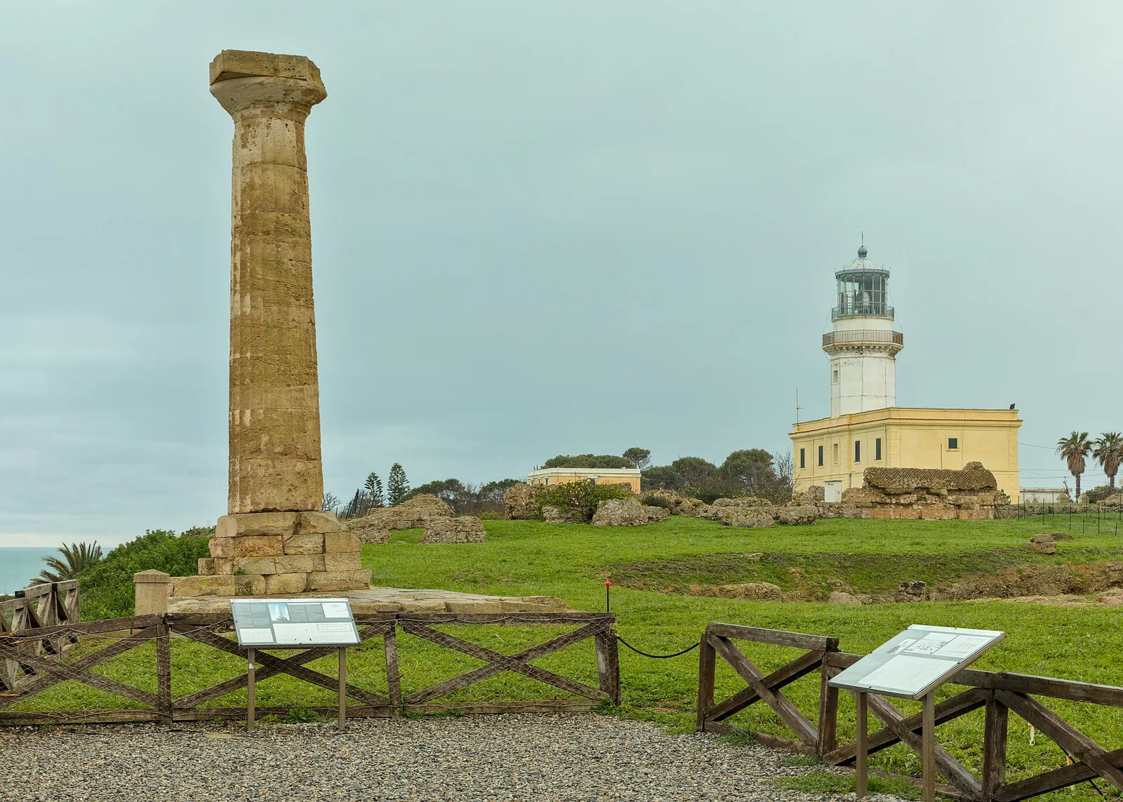 Column and lighthouse at Capo Colonna